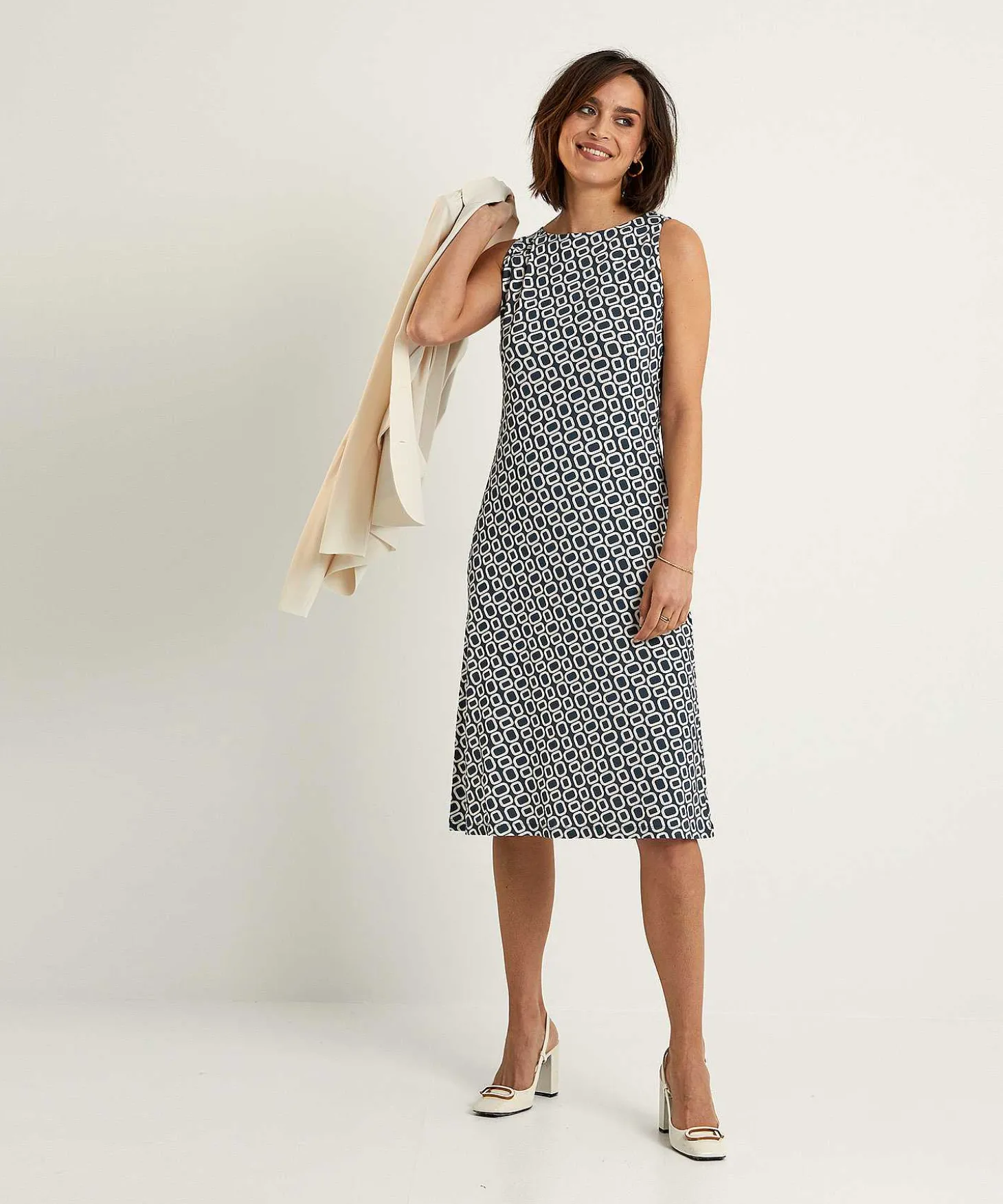 no_mans_land_slinky_sleev_3.webp Slinky Sleeveless Dress Retro Print*No Man's Land Clearance